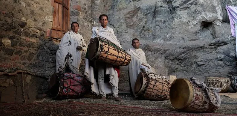 Ethiopian Orthodox drummers playing the kebero drum during the Fasika midnight vigil