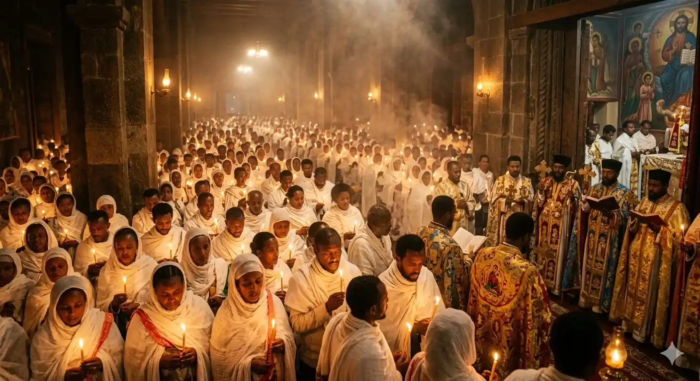 Ethiopian Orthodox priests in ornate robes leading the Fasika midnight vigil inside a candlelit church