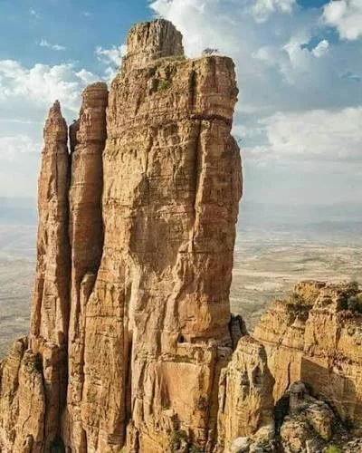 A monk overlooking the Gheralta valley at sunset, Tigray, Ethiopia