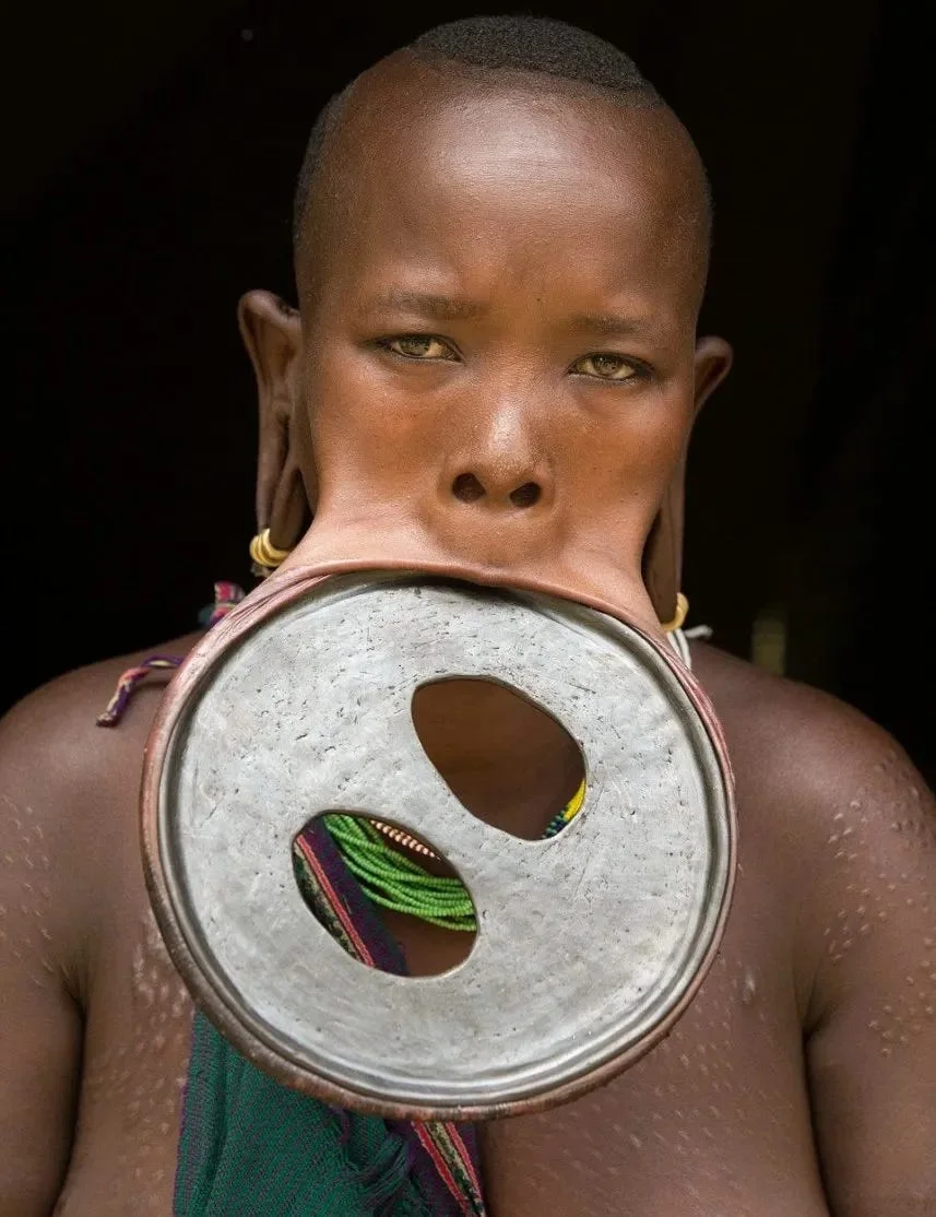 Mursi tribe woman with traditional lip plate, Omo Valley Ethiopia